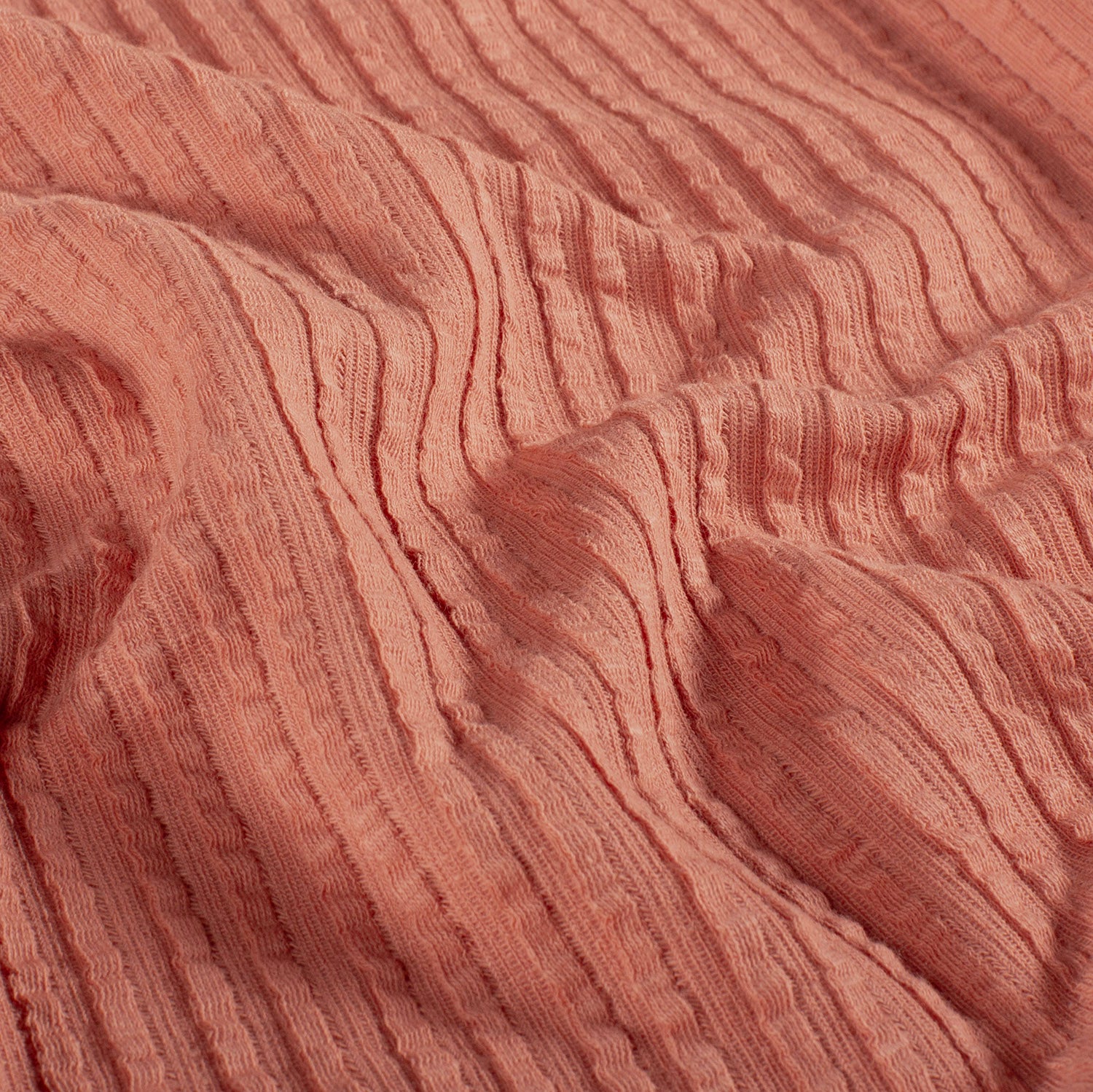 Ribjacquard jersey koraal